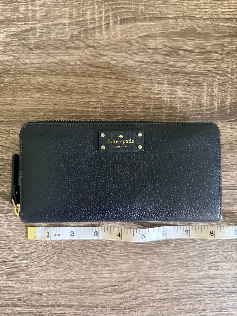 Kate Spade Pebbled Black Leather Zip-Around Wallet with Gold Plaque